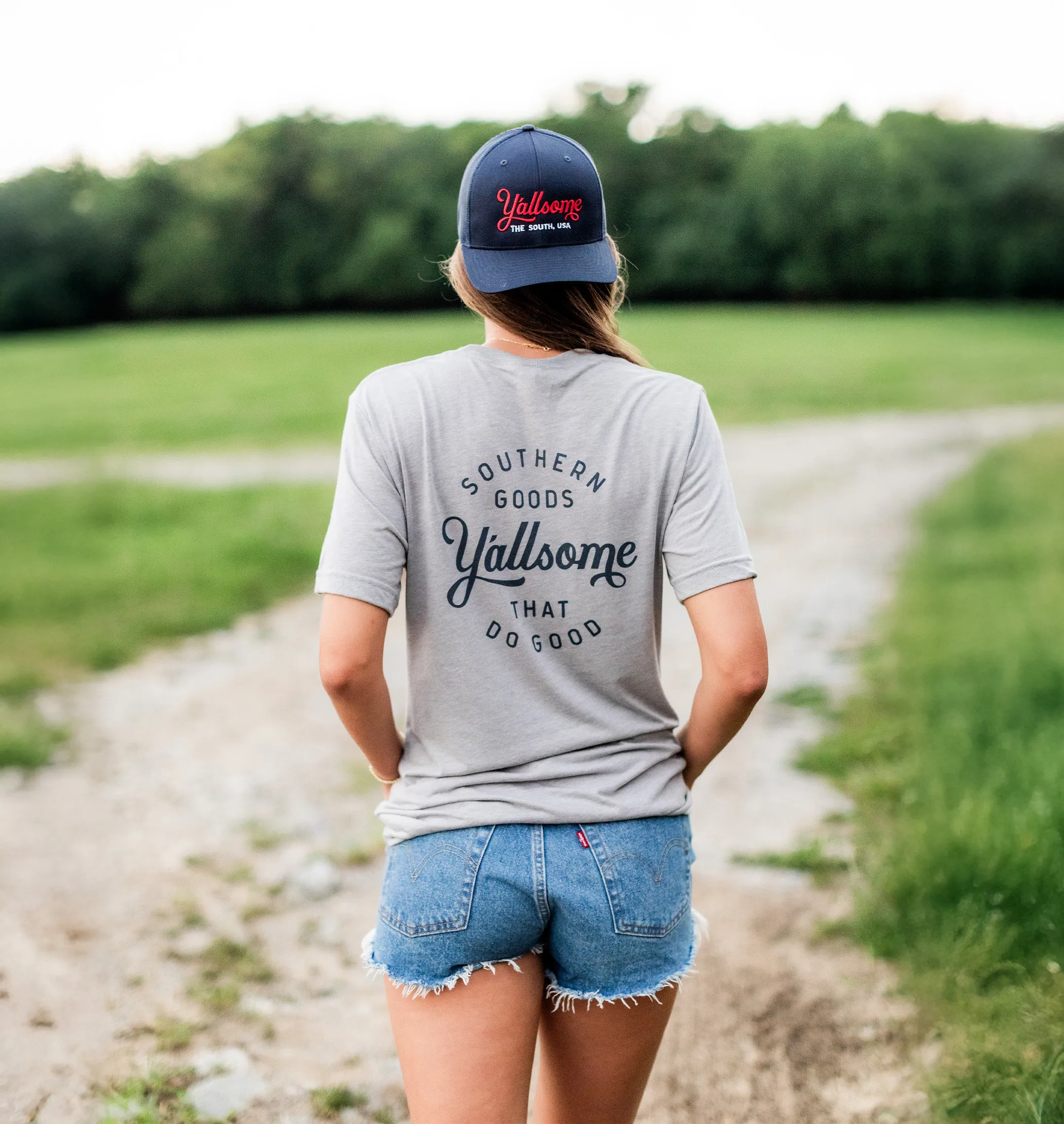 Y'allsome — Southern Goods That Do Good tee on a country road